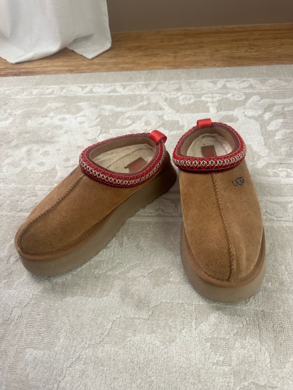 UGG Chestnut Brown Suede Slip-On Slippers with Red Trim - Picture 2 of 6